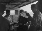 武工队在日伪碉堡内教育伪自卫团，冀中 An armed working detachment dissuades a puppet self- defense unit in a pillbox, Central Hebei
